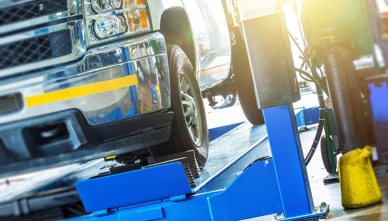 Car Wheel Alignment Check. Large Pickup Truck on the Alignment Equipment in the Car Service.; Shutterstock ID 496087558; purchase_order: -; job: -; client: -; other: -
