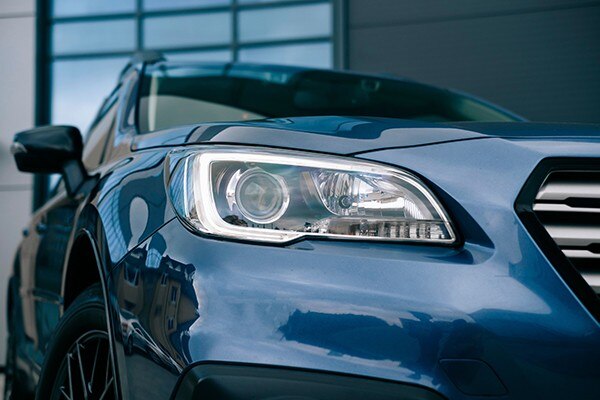 Modern compact SUV. Headlight of a modern luxury black car, auto detail,daytime running light.; Shutterstock ID 2261362993; purchase_order: Fleet - Web; job: ; client: ; other: 
